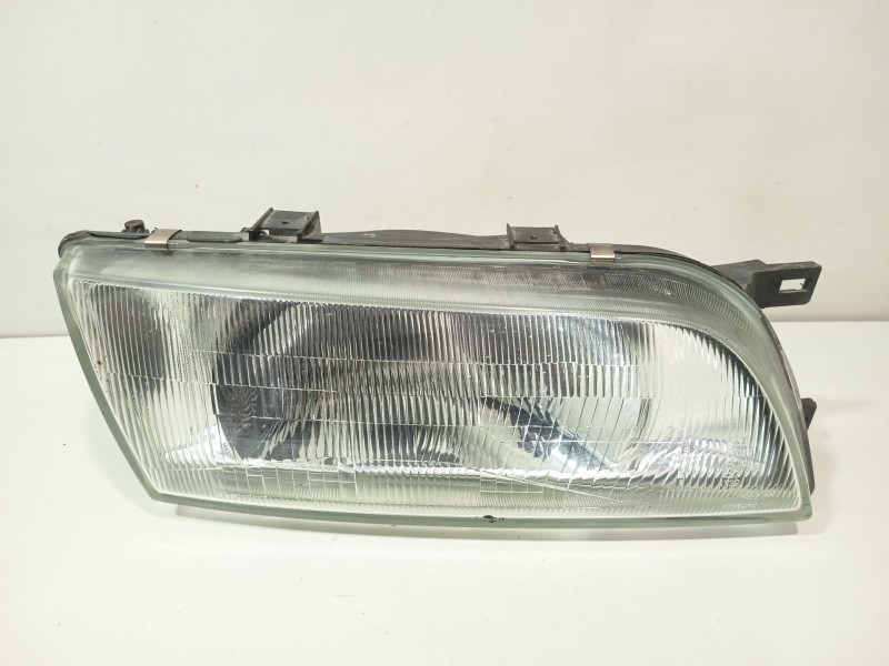 Recambio de faro derecho para nissan almera (n15) gx referencia OEM IAM 260101N726  