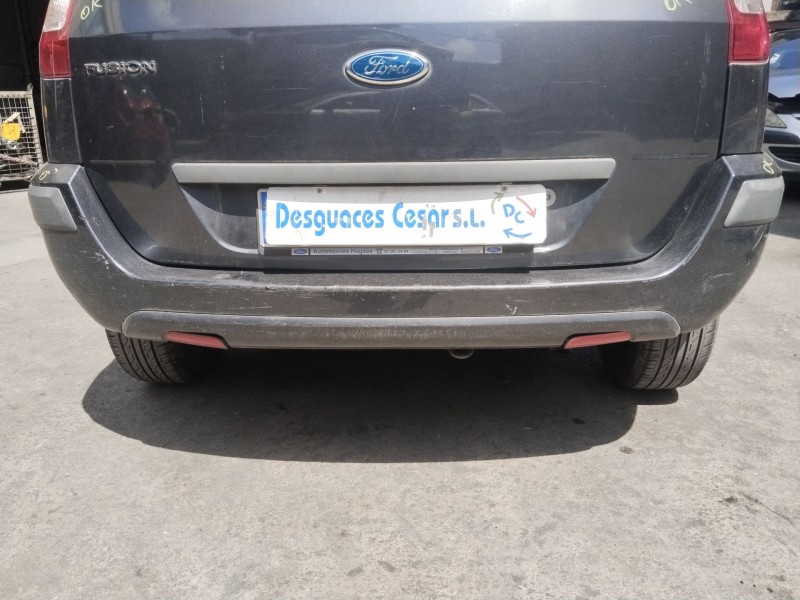 Recambio de paragolpes trasero para ford fusion (ju_) 1.4 referencia OEM IAM 1324511  