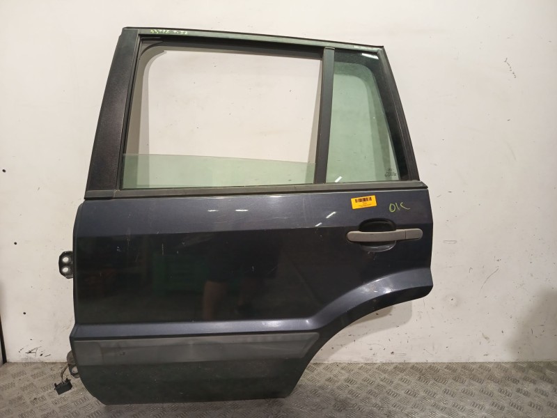 Recambio de puerta trasera izquierda para ford fusion (ju_) 1.4 referencia OEM IAM 1692558  GRIS