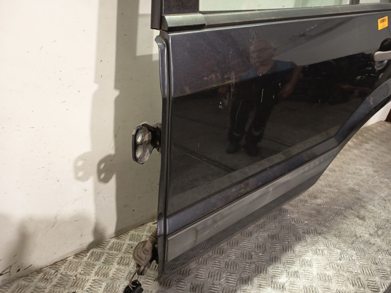 Recambio de puerta trasera izquierda para ford fusion (ju_) 1.4 referencia OEM IAM 1692558  GRIS