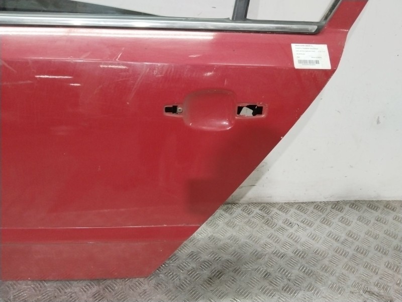 Recambio de puerta trasera izquierda para opel astra h berlina cosmo referencia OEM IAM  ROJO 