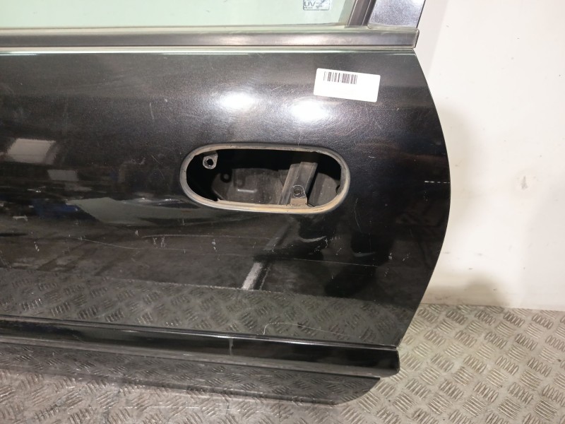 Recambio de puerta delantera izquierda para nissan almera ii hatchback (n16) 1.5 referencia OEM IAM 801015M332  NEGRO