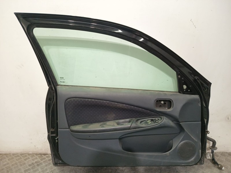 Recambio de puerta delantera izquierda para nissan almera ii hatchback (n16) 1.5 referencia OEM IAM 801015M332  NEGRO